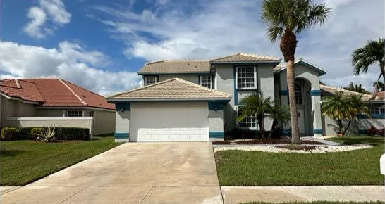 The same driveway after: bright, even concrete