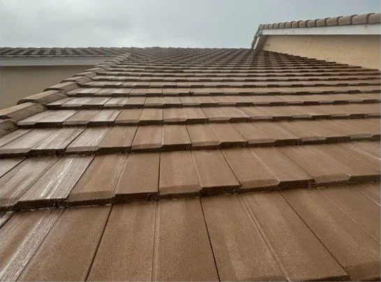 Roof after: warm terracotta tiles, mildew gone