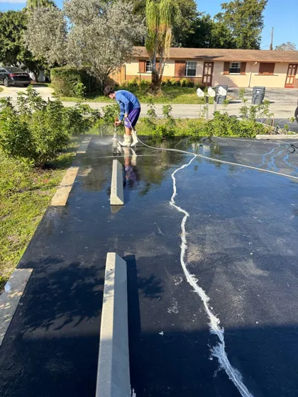 Pressure washing a commercial parking lot