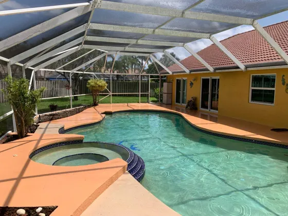 A screened pool enclosure after cleaning